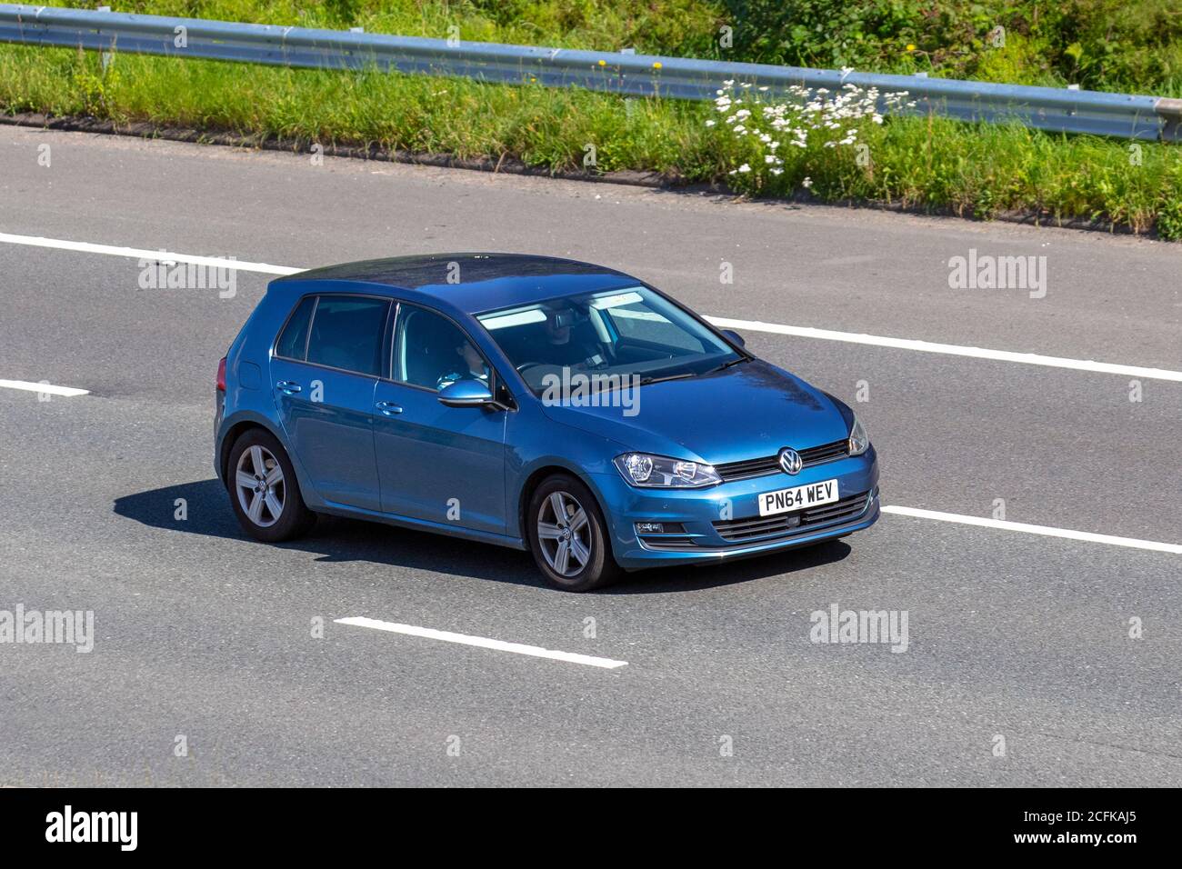 2014 blue VW Volkswagen Golf Match TSI BMT; Vehicular traffic moving  vehicles, cars driving vehicle on UK roads, motors, motoring on the M6  motorway highway network Stock Photo - Alamy