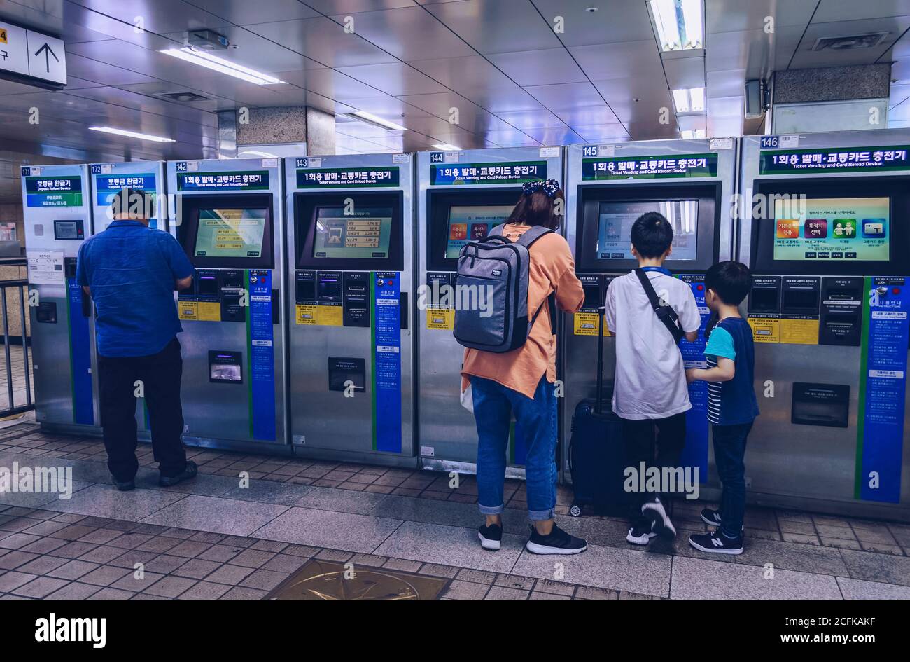 Seoul, South Korea – 16 September 2019 : people recharging their transport ticket pass near ticket vending and card reload device Stock Photo