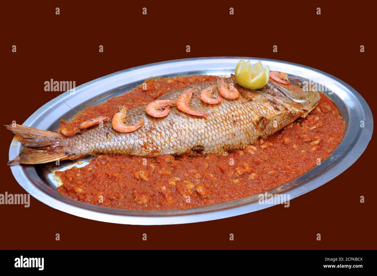 Fish tomato sauce hires stock photography and images Alamy