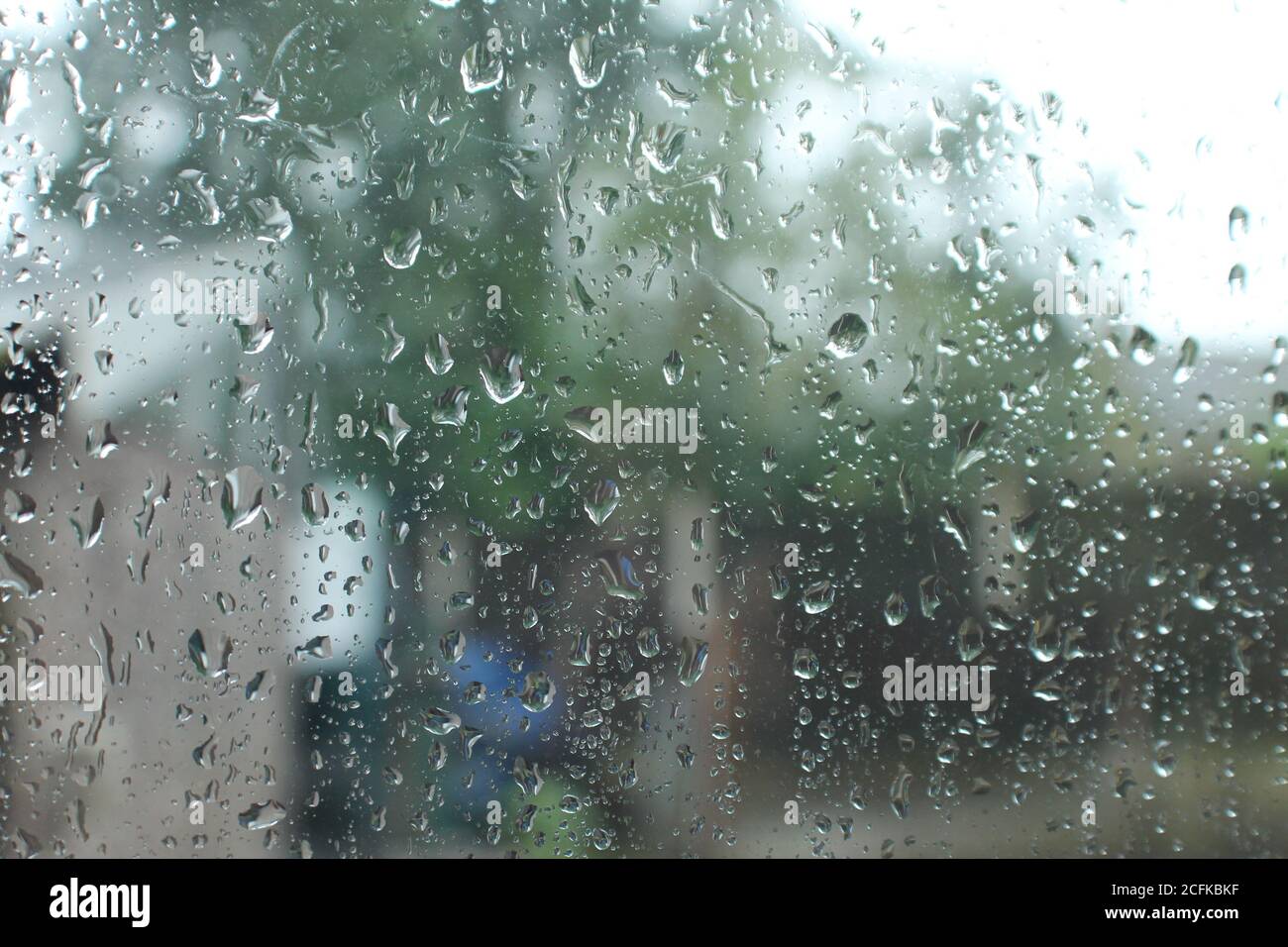 rain droplets on glass window Stock Photo