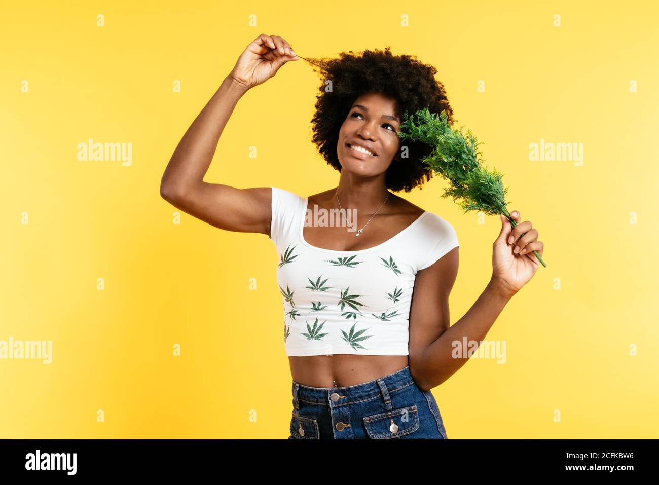 Happy black Woman with curly hair Stock Photo