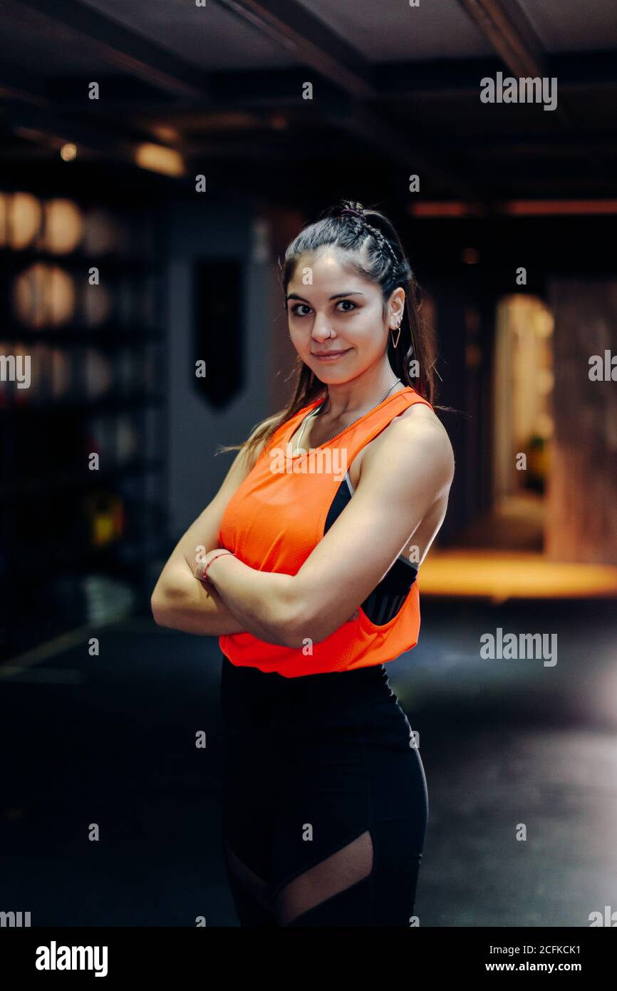 Muscular woman arms crossed hi-res stock photography and images - Alamy
