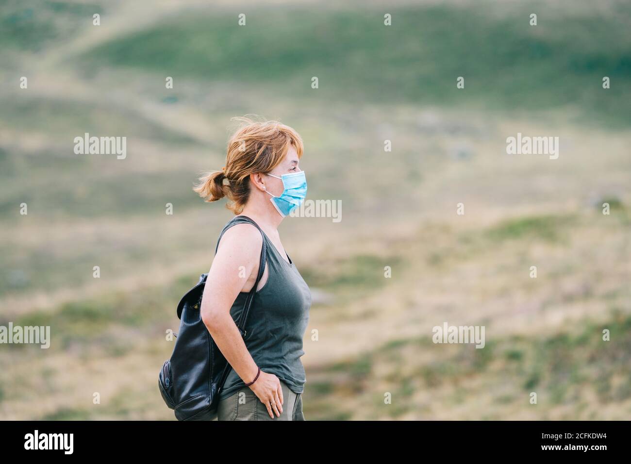 Mature woman in medical mask hi-res stock photography and images - Alamy