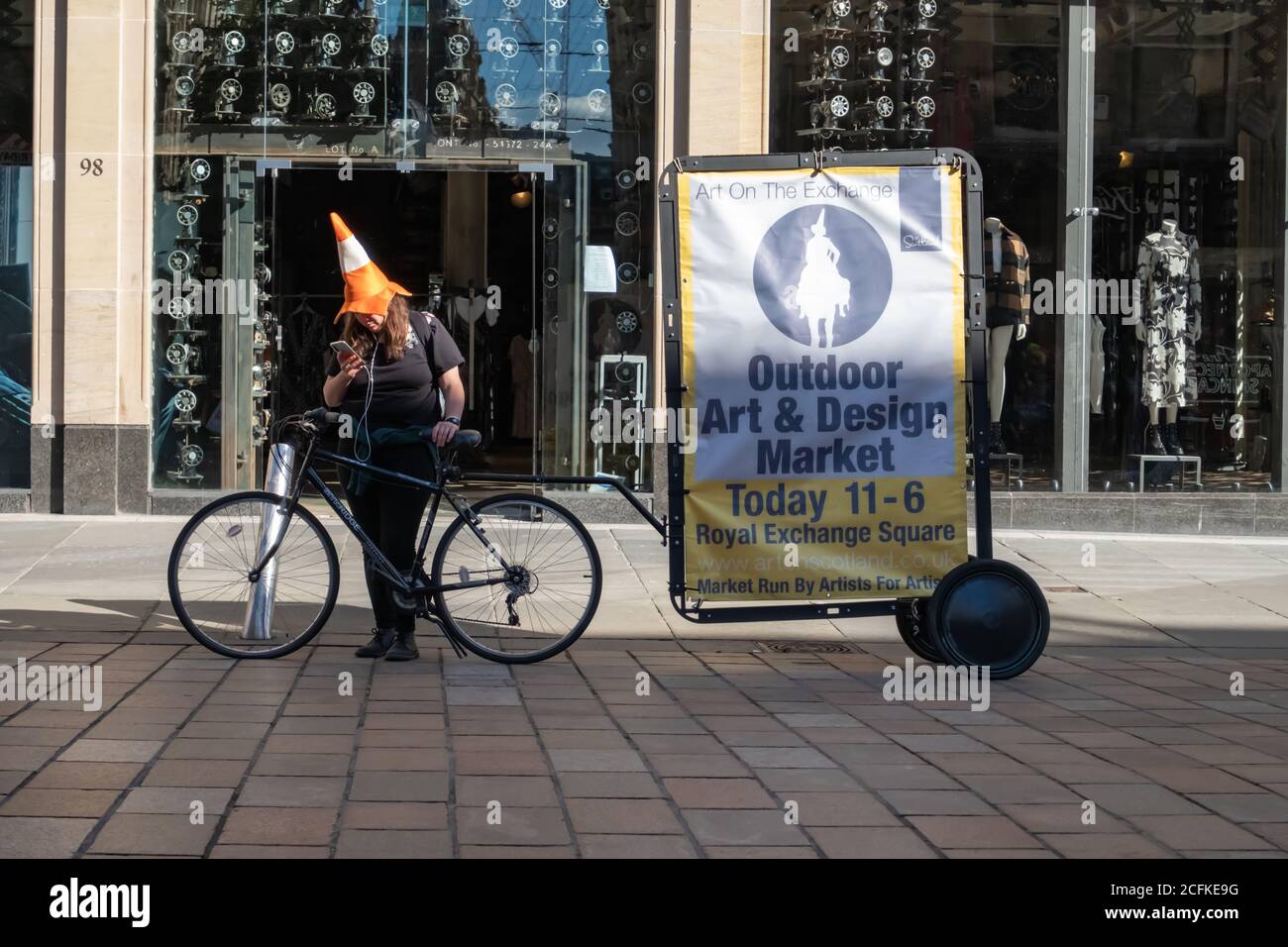 Glasgow, Scotland, UK. 5th September, 2020. UK Weather. A girl using