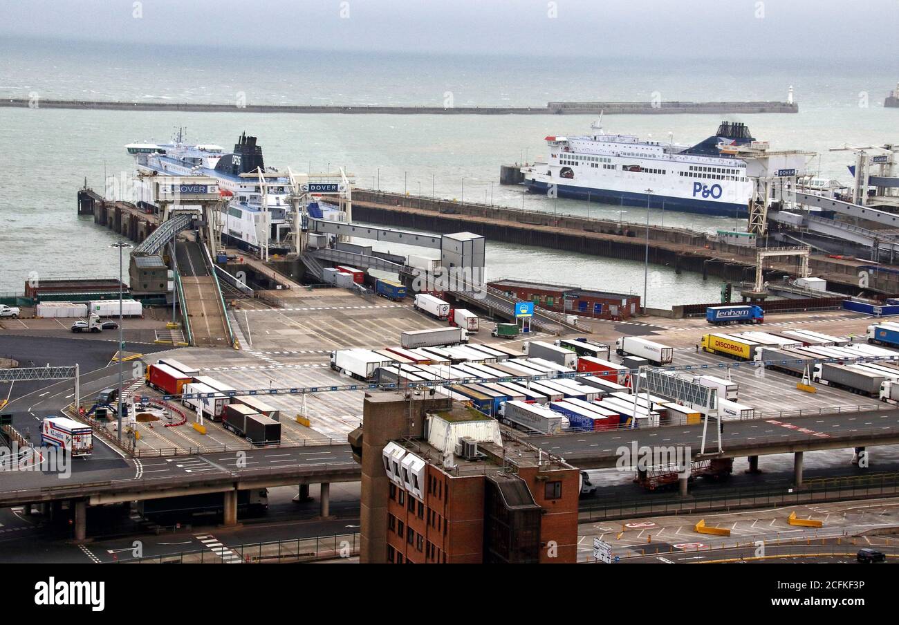 Lorries being loaded and offloaded at Dover ferry port.Very little sign of anything other than lorry freight at Dover terminal. No foot passengers or cars appear to be embarking or disembarking with the recent need to self-isolate when travelling home from France seemingly hitting Dover hard. The UK's major cross channel ferry port has been hit twice this year. Firstly, the continued uncertainty over how Brexit will affect the European trading and now the Covid-19 quarantine restrictions that were put in place a fortnight ago. Stock Photo