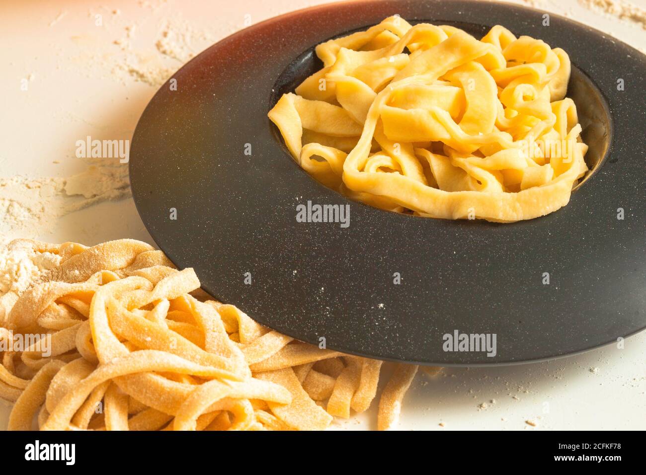 home cooking - making italian pasta from dough Stock Photo