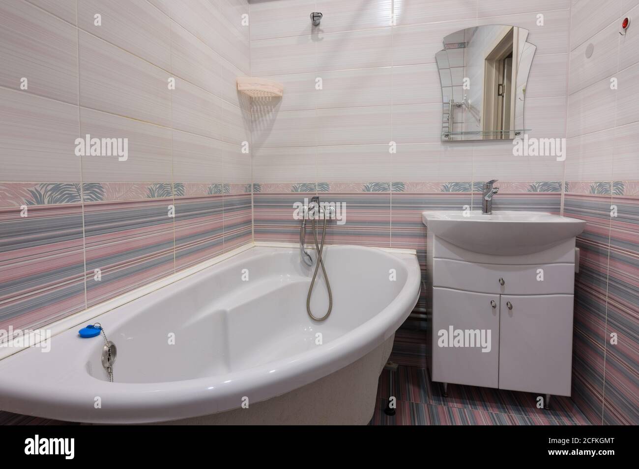 The interior of an ordinary habitable bathroom in the interior of a