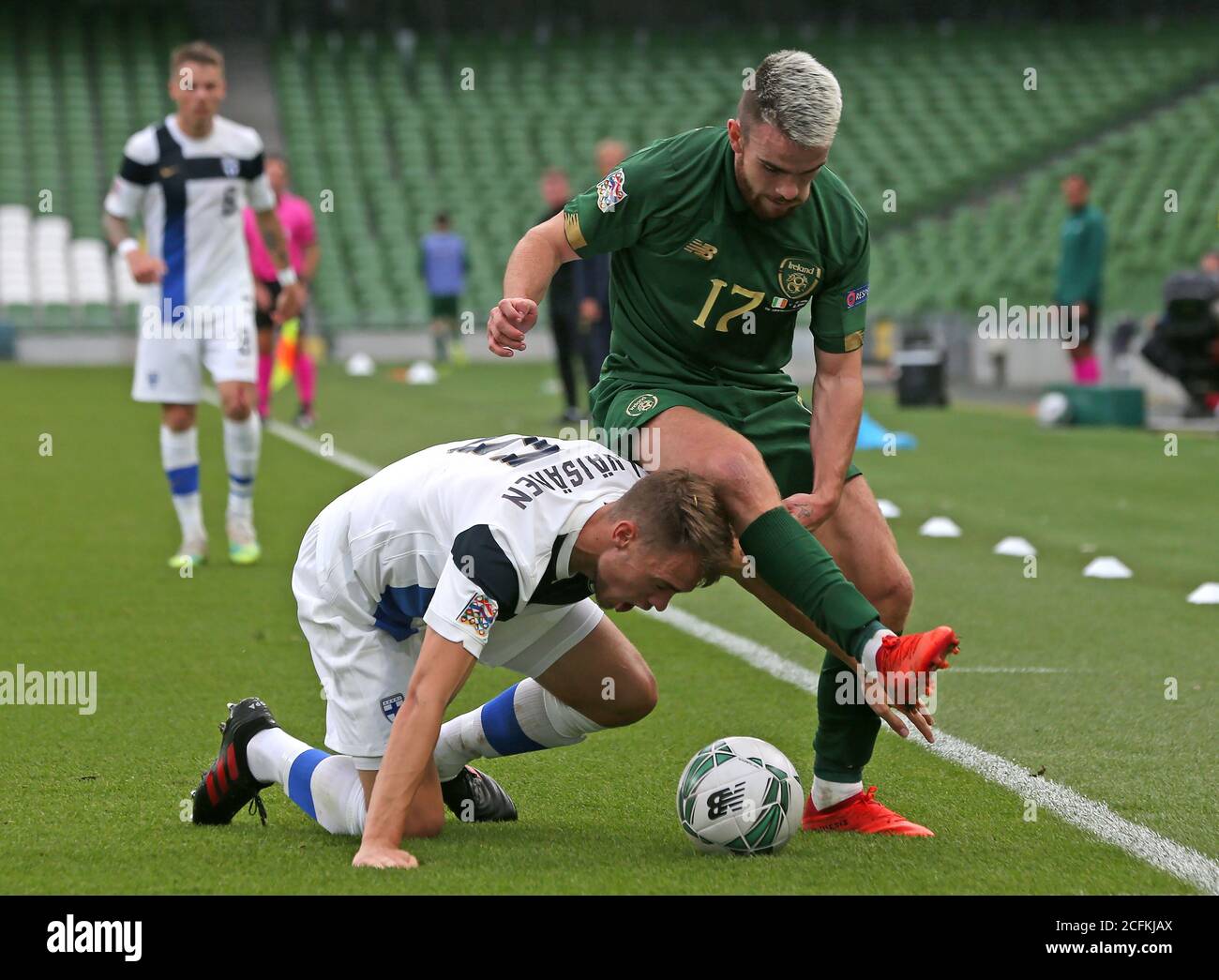 Finland's Sauli Vaisanen (left) and Republic of Ireland's Aaron Connolly battle for the ball during the UEFA Nations League Group 4, League B match at Aviva Stadium, Dublin. Stock Photo