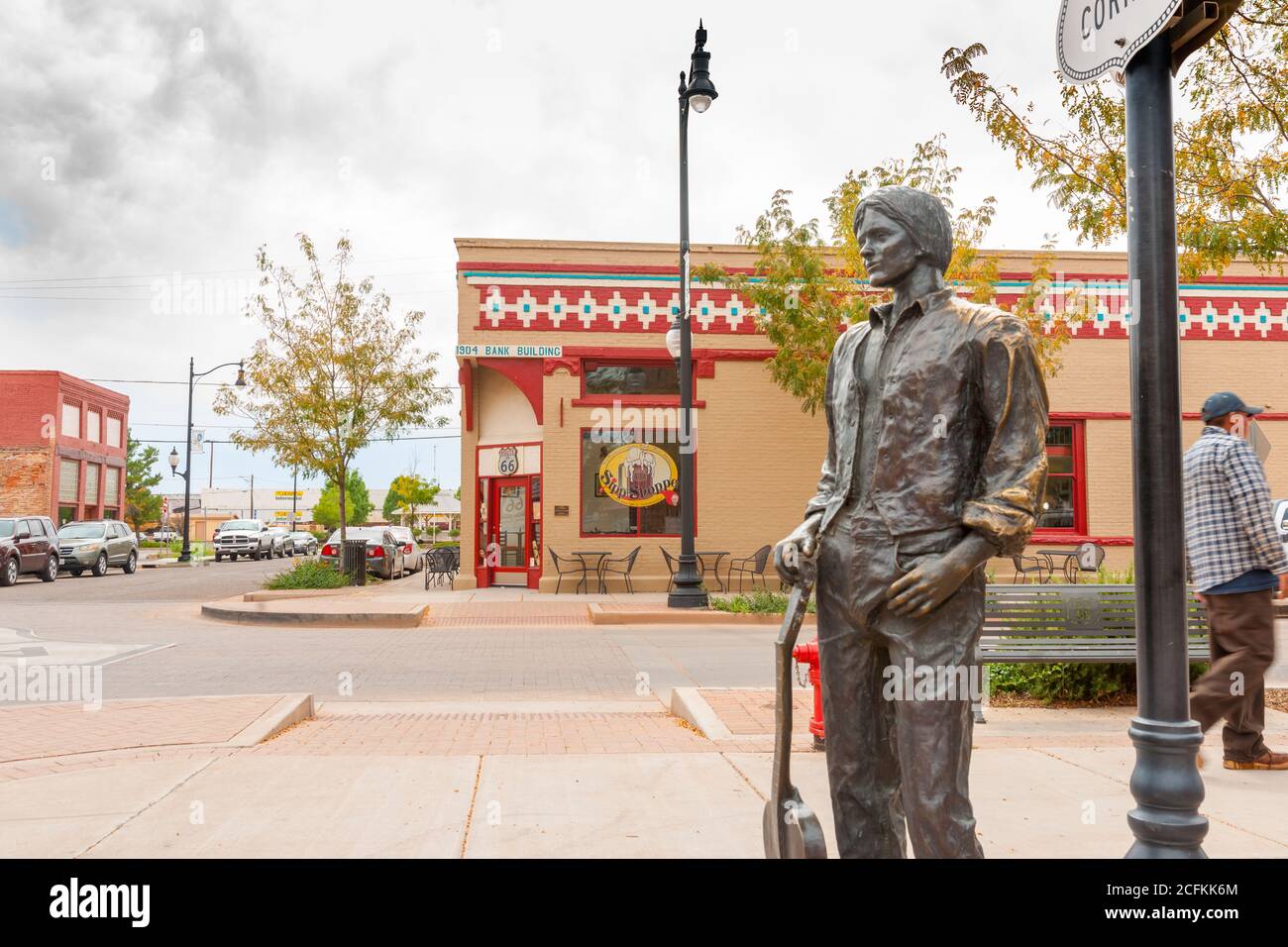 Winslow Arizona USA - September 22 2015; famous  Winslow Arizona  statue of Eagles band-member Glenn Frey  Satnding on the Corner Stock Photo