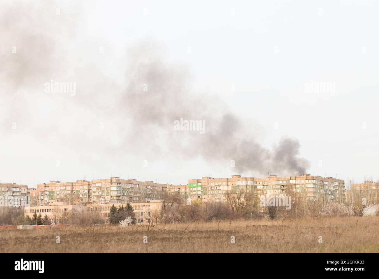 Fire and smoke blaze from apartment in high residential buildings Stock ...