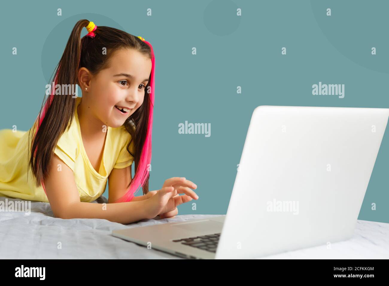 Cute little girl using laptop at home. Education, online study, home ...