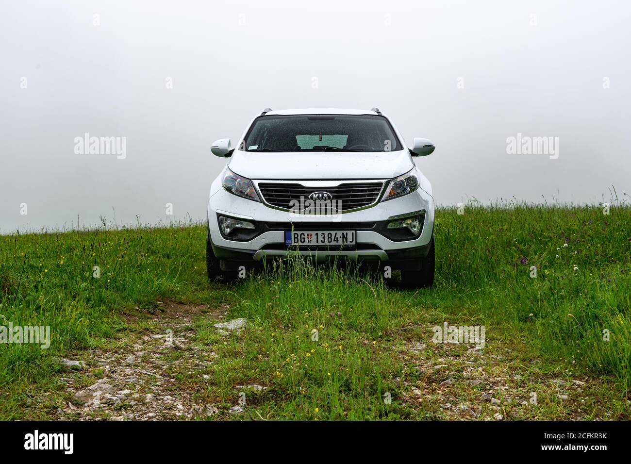 Kia Sportage 2.0 CRDI awd or 4x4, on the dirth road, in deep forest