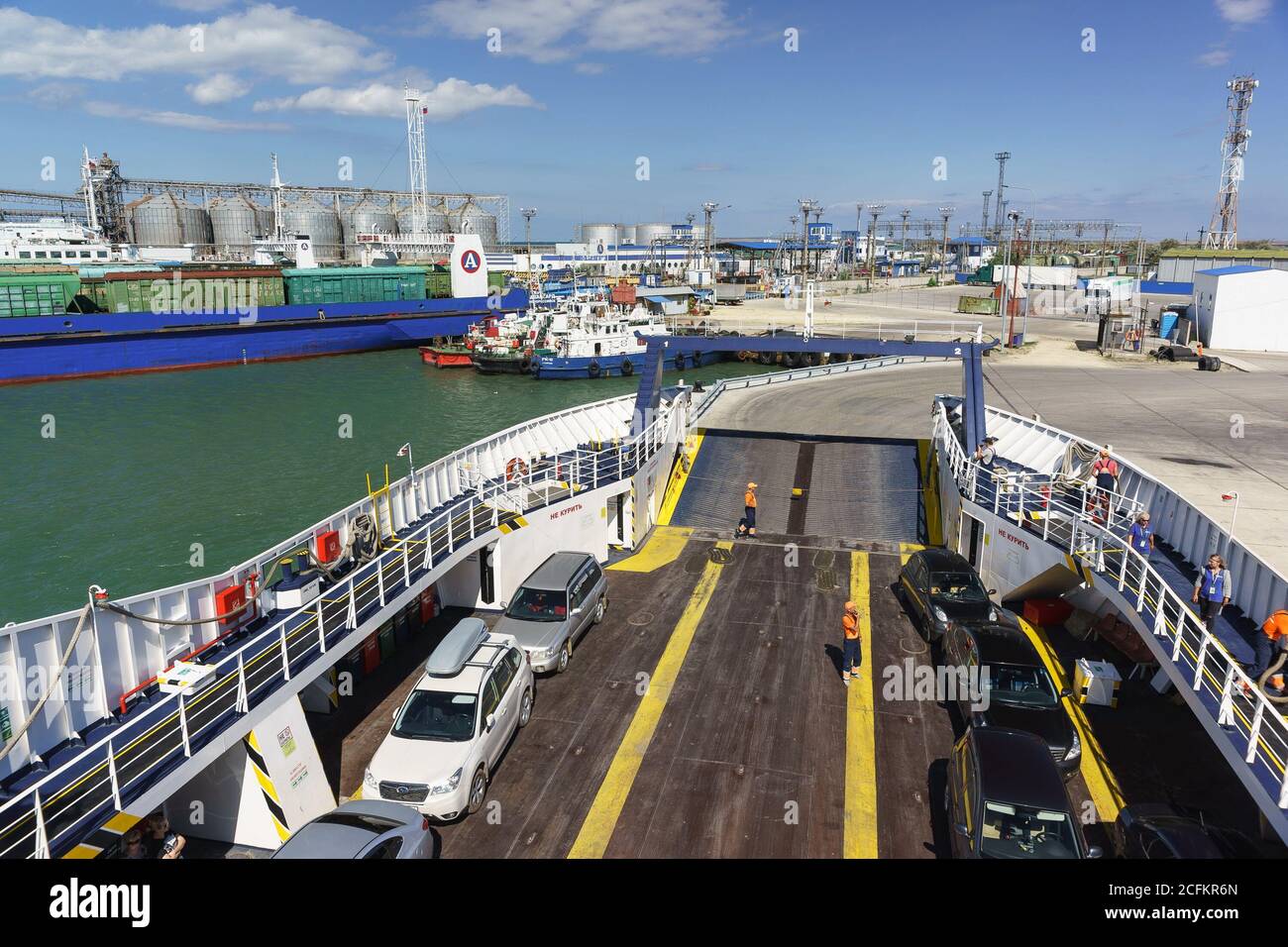 Russia, the Kerch Strait - September 02.2017: Loading cars on the ferry 'Major Capiche' the cargo seaport of the Crimea. Stock Photo