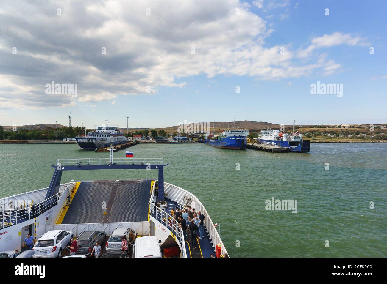Russia, the Kerch Strait - September 02.2017: Ferry 'Major Capiche' in the port of Crimea close to the pier for unloading. In a portrait are the ferri Stock Photo