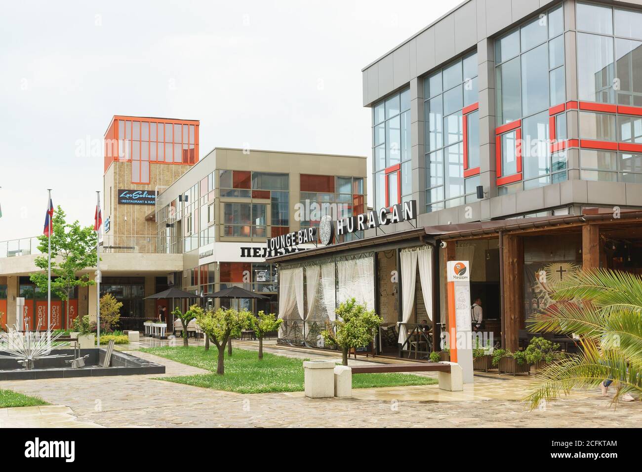 Russia, Sochi, Krasnodar region - June 07.2017: the on-site Restaurants, shopping and entertainment center Mandarin in Adler. Cloudy day in early summ Stock Photo