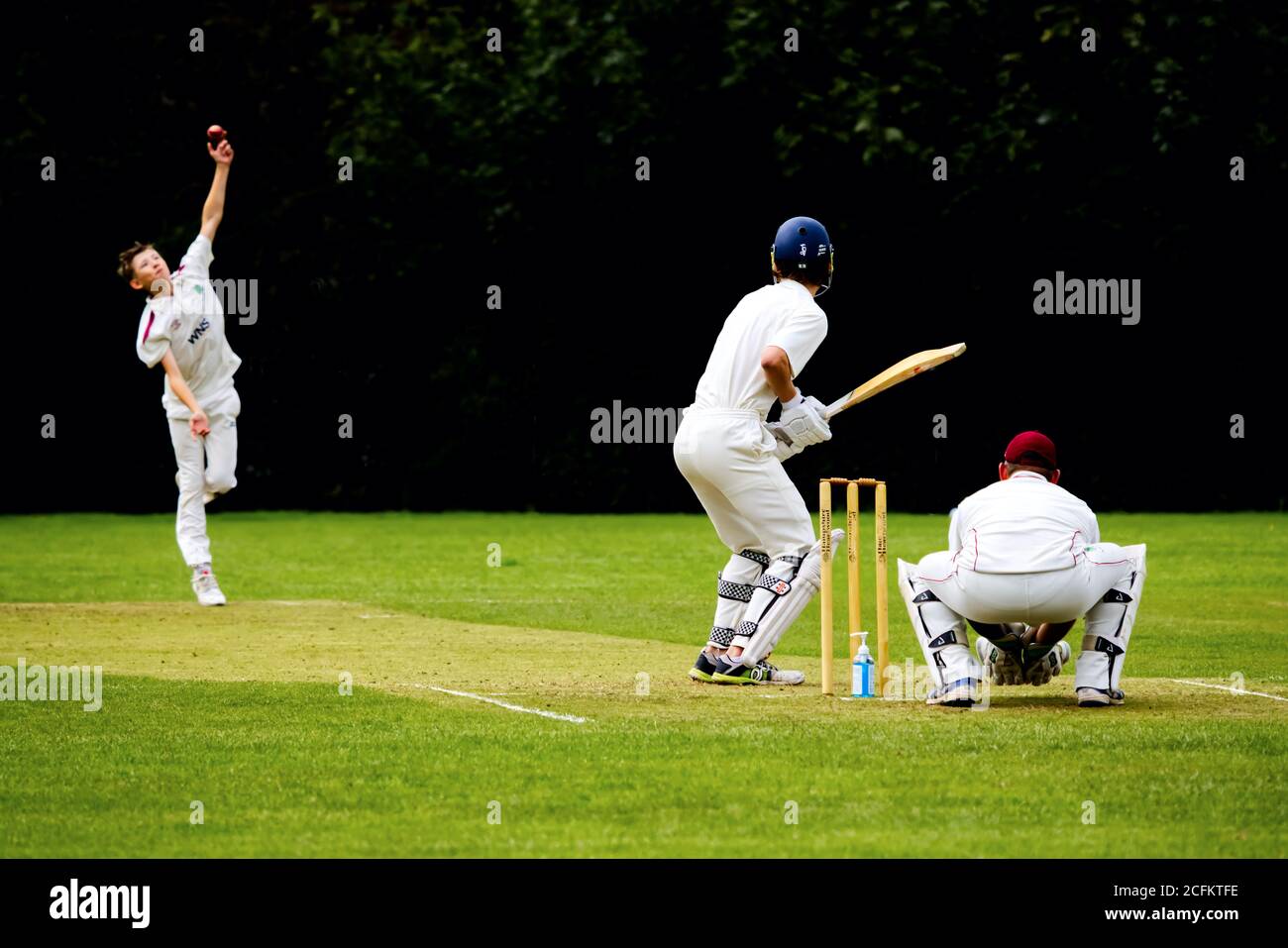 Bowling to a batsman in a village cricket match Stock Photo