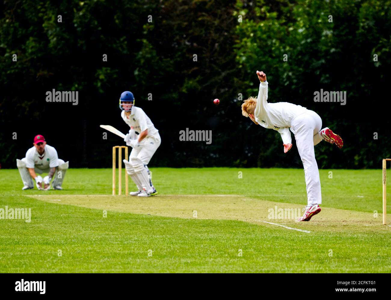 Bowling to a batsman in a village cricket match Stock Photo