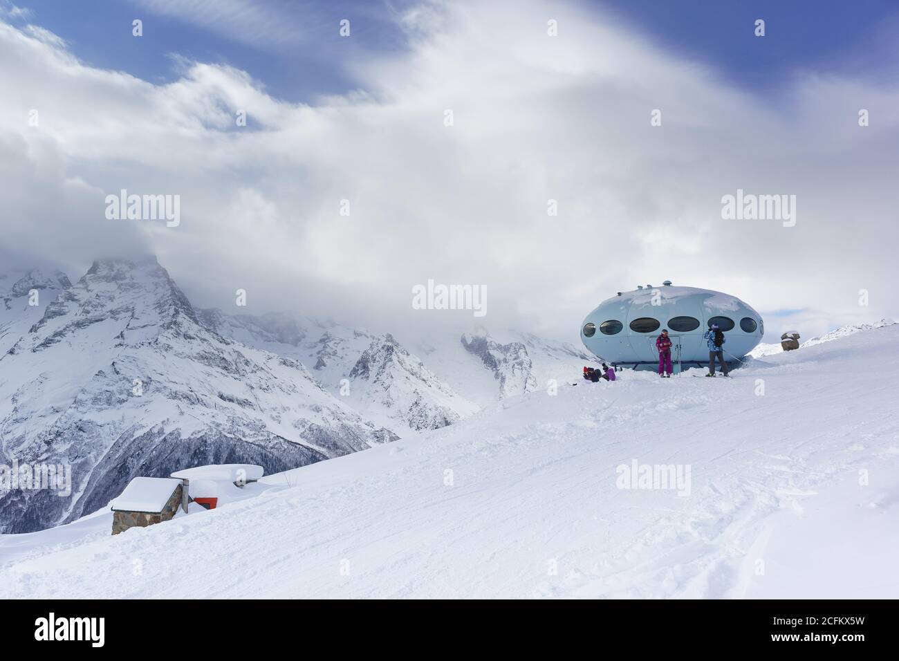 Dombay, Karachay-Cherkess Republic, Russia - December 15, 2018: high-Altitude mini-hotel 'Plate' on the slope of the mountain Moussa-Achitara on the f Stock Photo