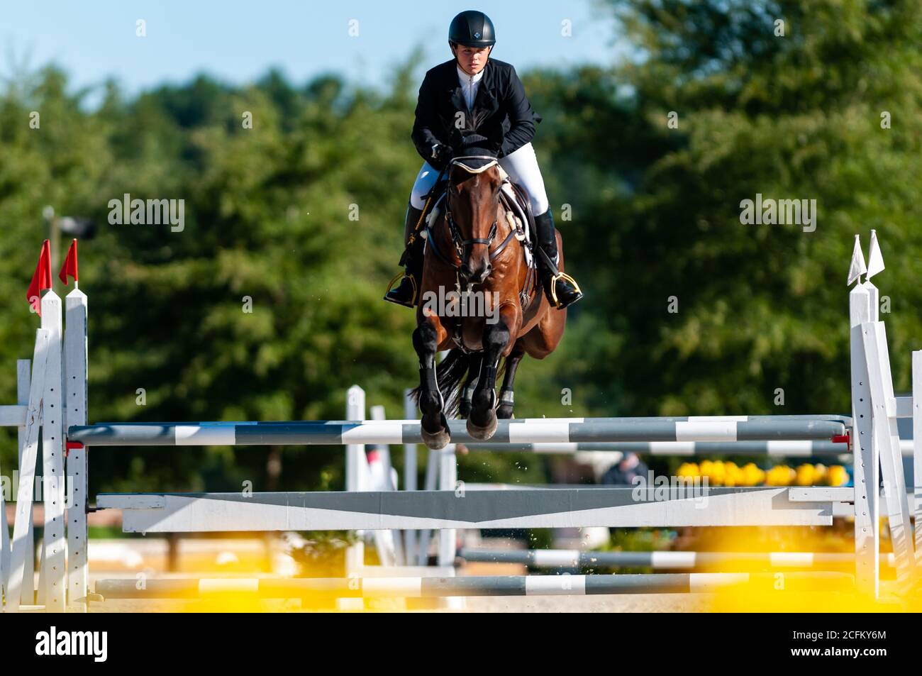 September 6, 2020, Raeford, North Carolina, USA: Sept. 6, 2020 - Raeford, North Carolina, USA - BRITTANY CRANDALL riding Cooley Almighty competes in show jumping at the Five Points Horse Trials, Sept. 5, 2020 at Carolina Horse Park in Raeford, N.C. The horse trial event consists of three distinct tests - dressage, cross-country, and show jumping, usually taking place on one or two days. The competitors must ride the same horse throughout each event. The Five Points Horse Trials attracts riders and their horses from across the eastern United States. (Credit Image: © Timothy L. Hale/ZUMA Wire) Stock Photo