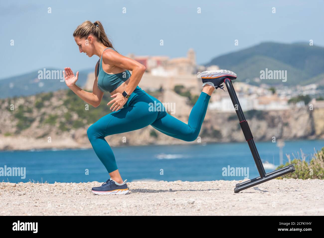 Determined woman doing squat hi-res stock photography and images - Alamy
