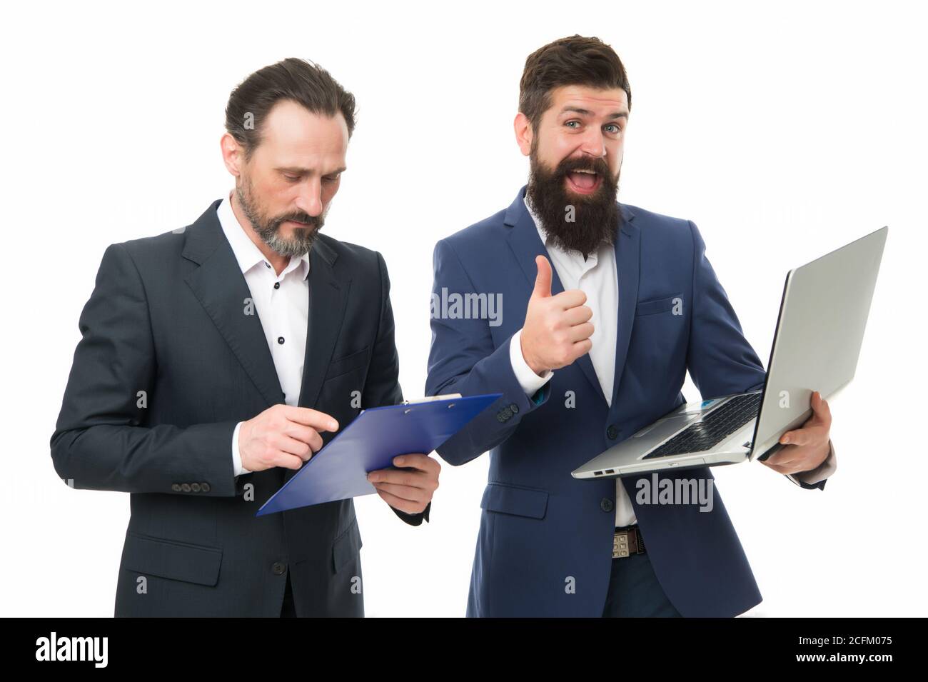 Best practice in professional service. Bearded men work on professional computer. Businessmen show thumbs up while working. Professional occupation and career. Professional skills. Professionalism. Stock Photo