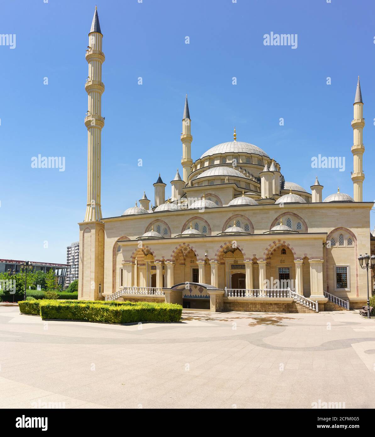 Grozny, Chechen Republic, Russia - June 02, 2019: the Facade of the Mosque the Heart of Chechnya named after Akhmat Kadyrov on a Sunny summer day. One Stock Photo
