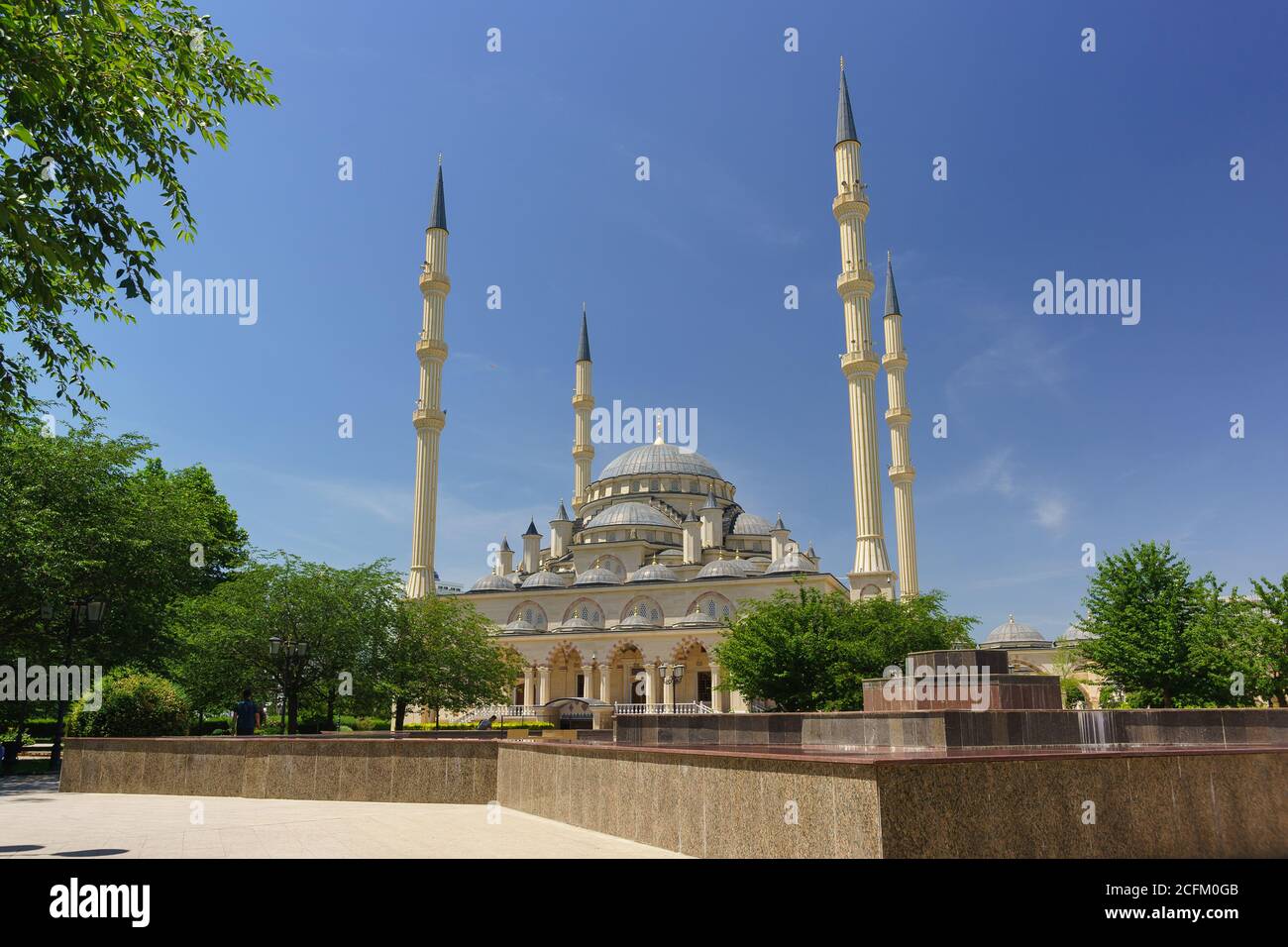 Grozny, Chechen Republic, Russia - June 02, 2019: Domes and minarets Of the Akhmat Kadyrov heart of Chechnya mosque on a Sunny summer day Stock Photo