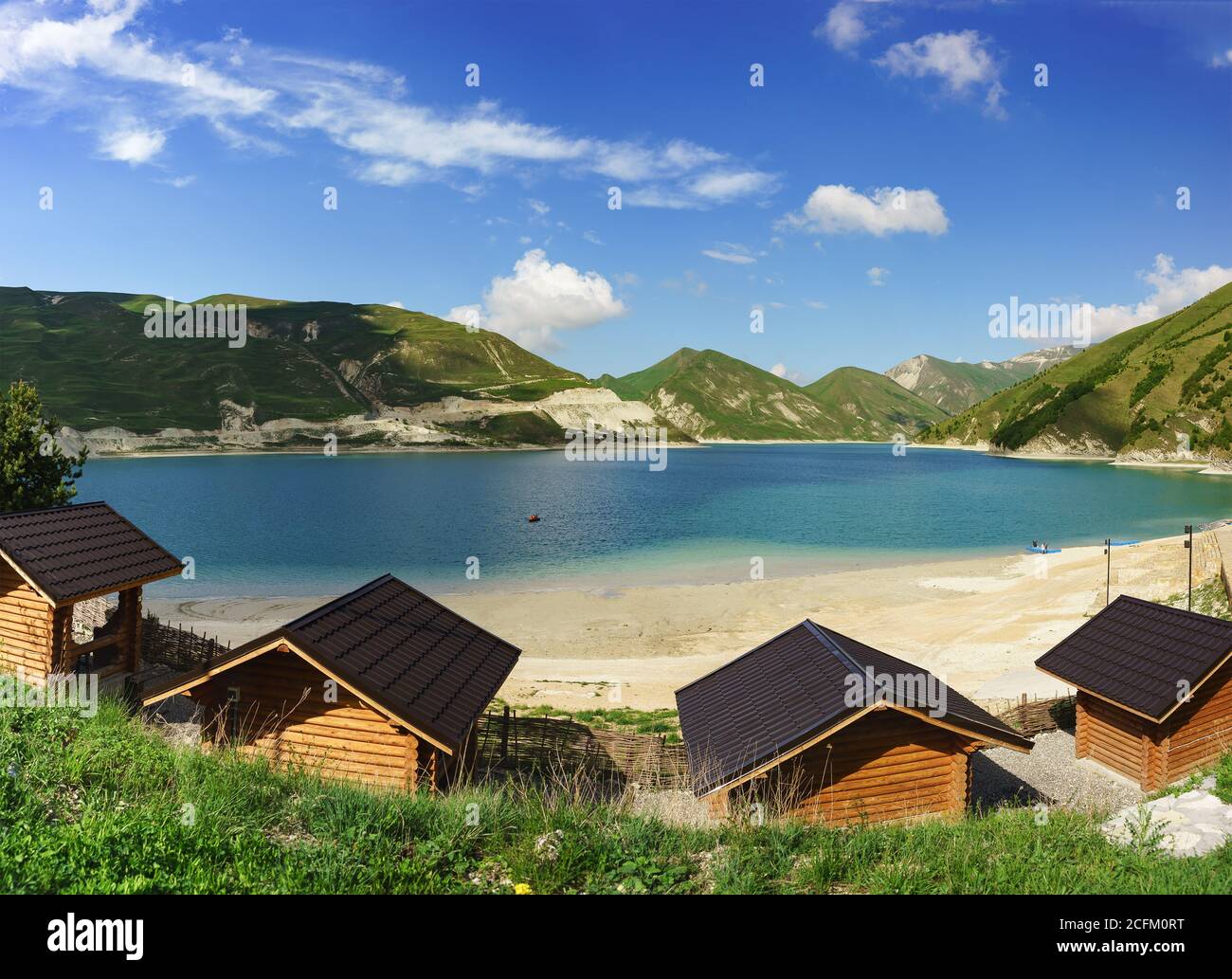 Vedensky district, Chechen Republic, Russia - June 01, 2019: Gazebos for rest on the shore of the high-mountain lake Kezenoi Am. Weekend in early summ Stock Photo