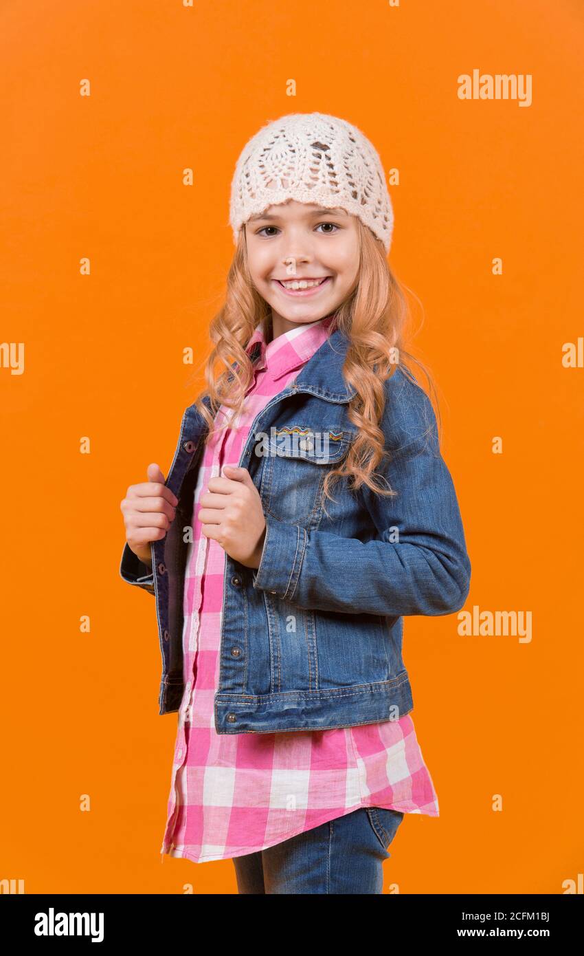 Child smile with long blond hair. Girl in jeans suit, hat, plaid shirt on orange background. Happy childhood concept. Beauty, look, hairstyle. Fashion, style, trend Stock Photo - Alamy Child smile with long blond hair. Girl in jeans suit, hat, plaid shirt on orange background. Happy childhood concept. Beauty, look, hairstyle. Fashion, style, trend Stock Photo - Alamy