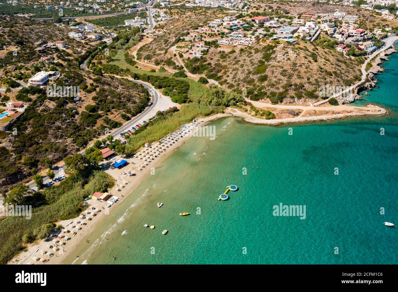 Aerial view of Almyros beach near the town of Agios Nikolaos in Crete, Greece Stock Photo