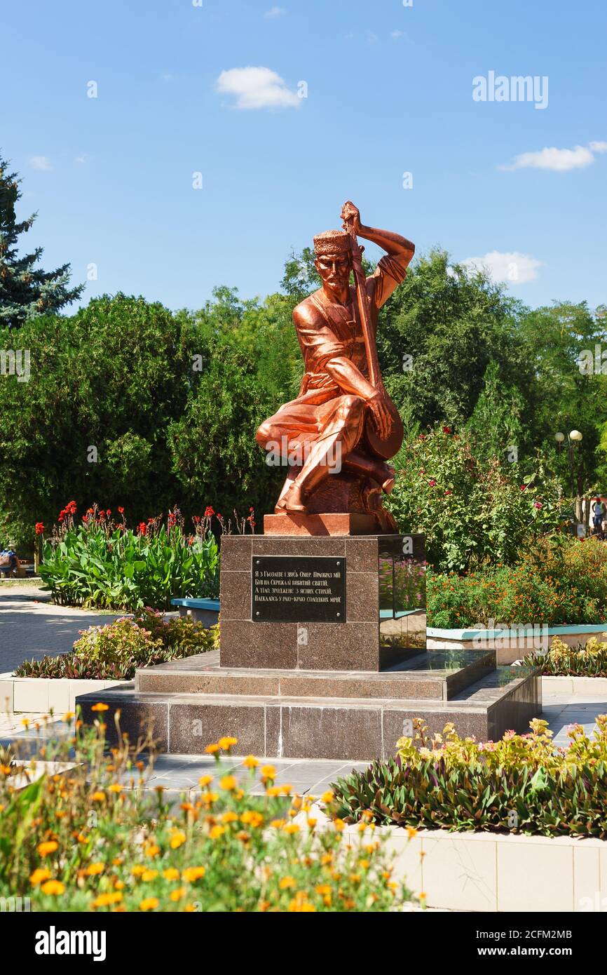 Evpatoria, Crimea, Russia-September 8, 2019: Monument to Ashik Omer-an outstanding Crimean Tatar poet and traveler of the middle ages, playing the saz Stock Photo