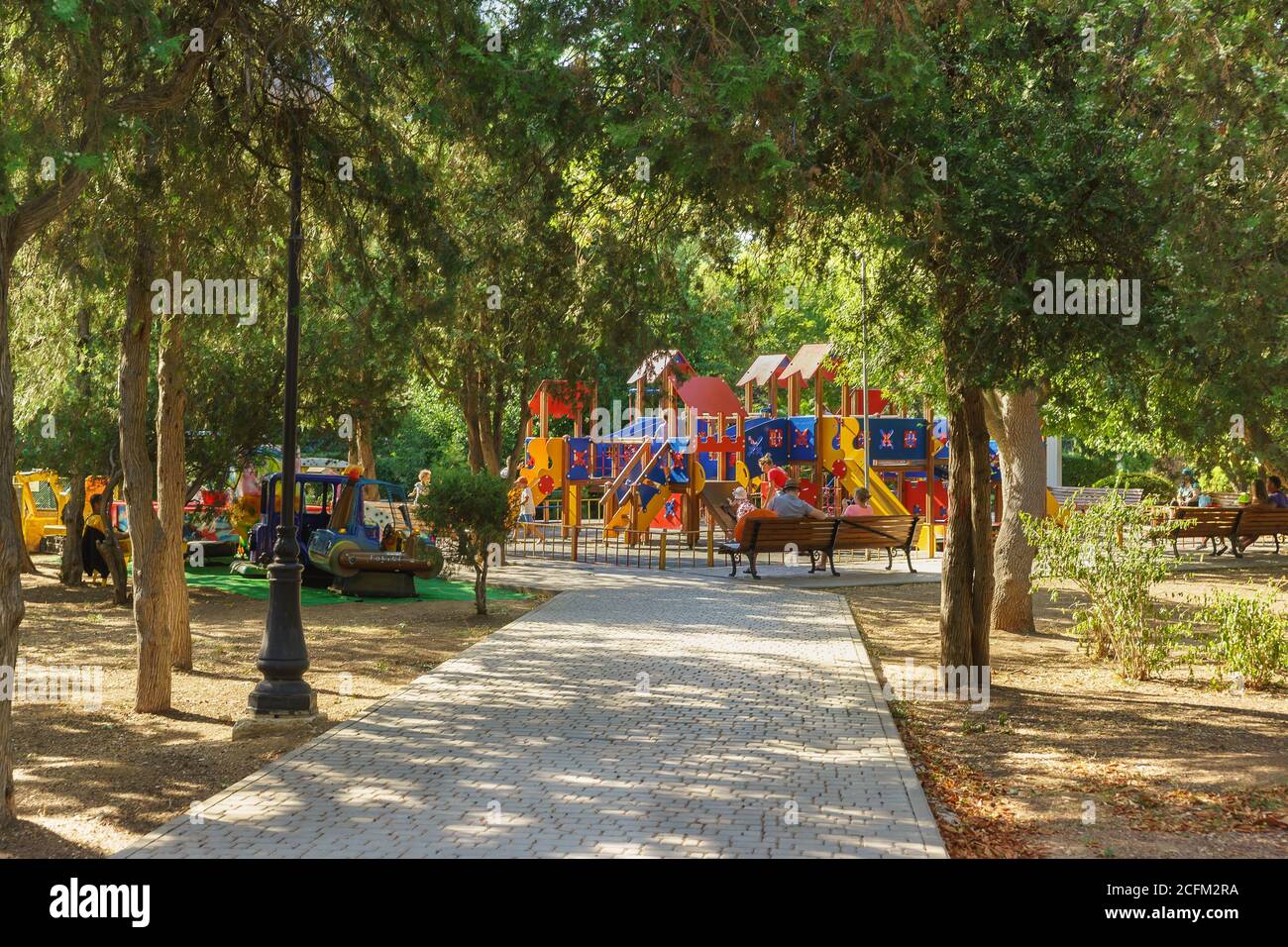 Evpatoria, Crimea, Russia-September 8, 2019: Bright Playground in a shady Park of the resort city Stock Photo