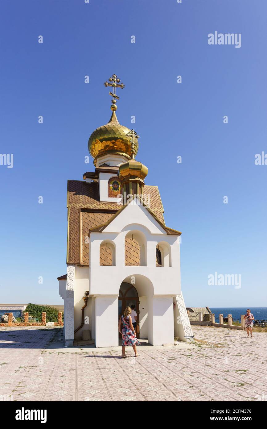 Tarkhankut, Crimea, Russia-September 11, 2019: People inspect the Church-chapel of St. Nicholas, the patron Saint of seafarers, on the territory Of th Stock Photo