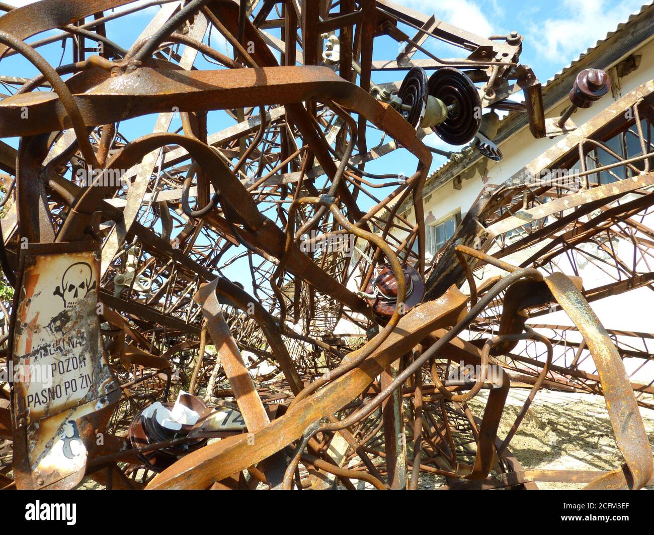 Pile of rusty metal on abandoned salt factory. Trash. Garbage. Scum. Rubbish. Horror. Corrosion of metal. Apocalyptic background. Stock Photo