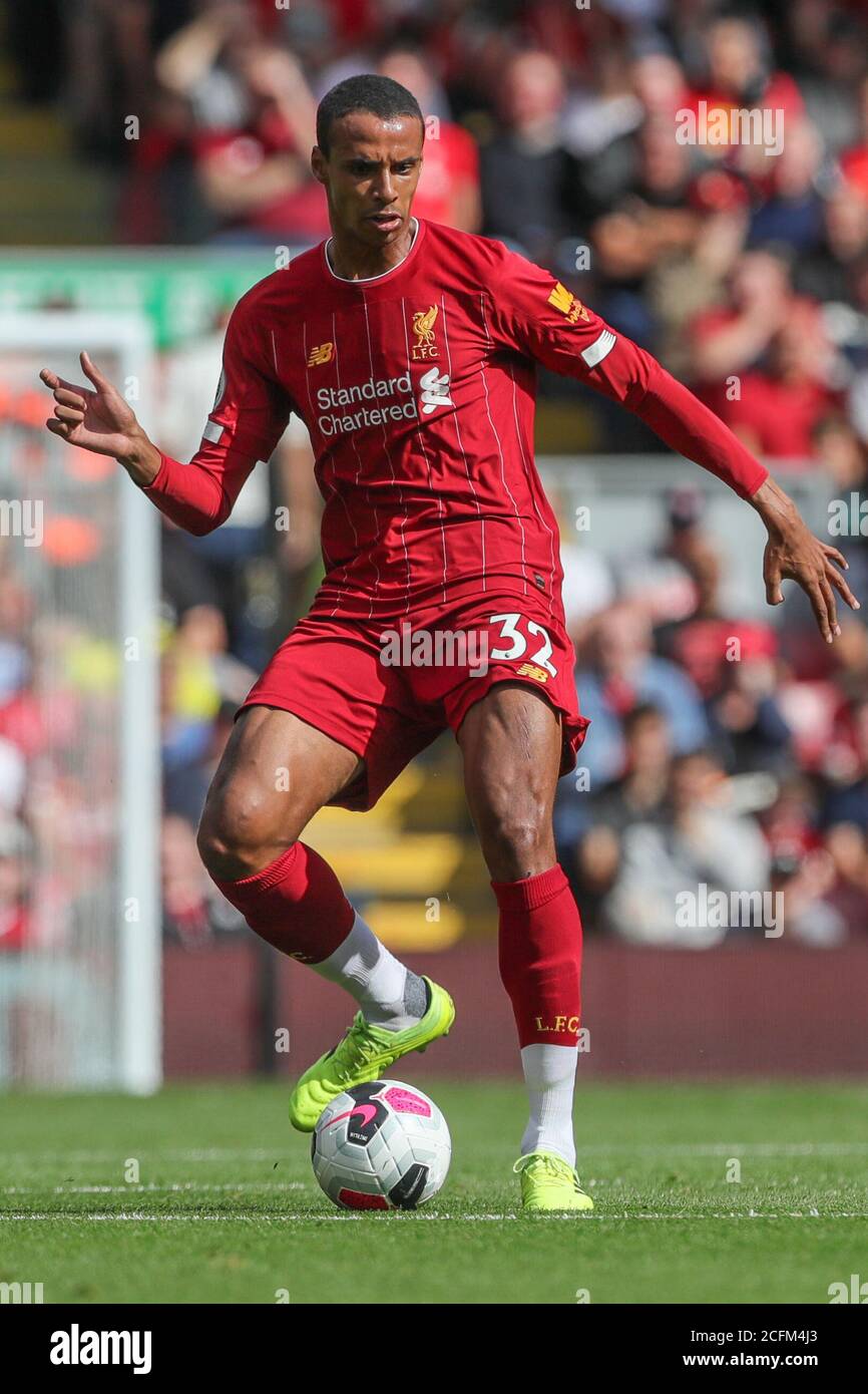 14th September 2019 , Anfield, Liverpool, England; Premier League Football, Liverpool vs Newcastle United ; Joel Matip (32) of Liverpool  passes the ball   Credit: Mark Cosgrove/News Images    Premier League/EFL Football images are subject to DataCo Licence Stock Photo