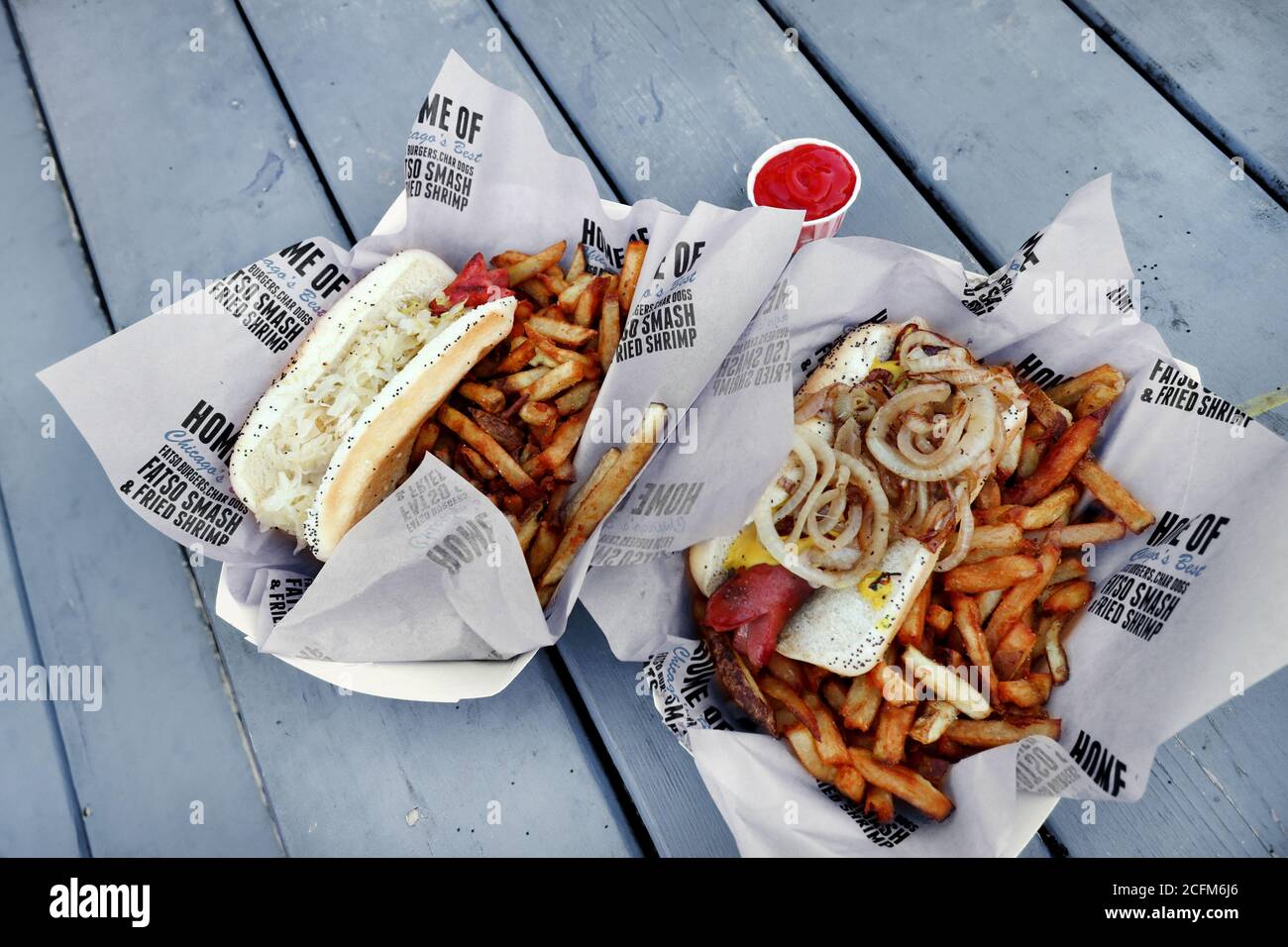 Famous Polish Hot Dogs with French Fries and Onion Rings, Chicago, USA Stock Photo