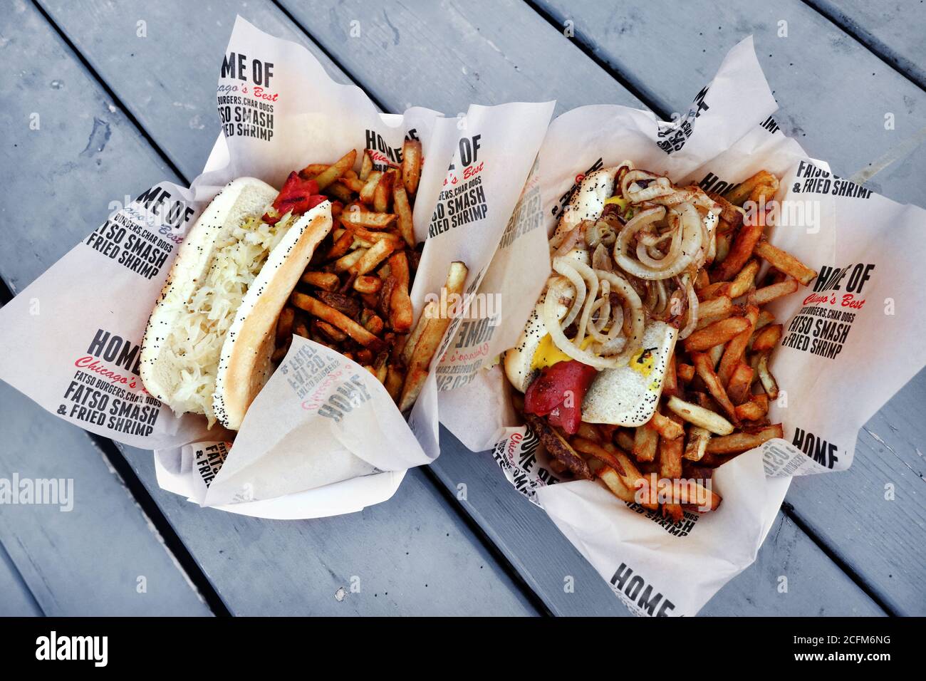 Famous Polish Hot Dogs with French Fries and Onion Rings, Chicago, USA Stock Photo