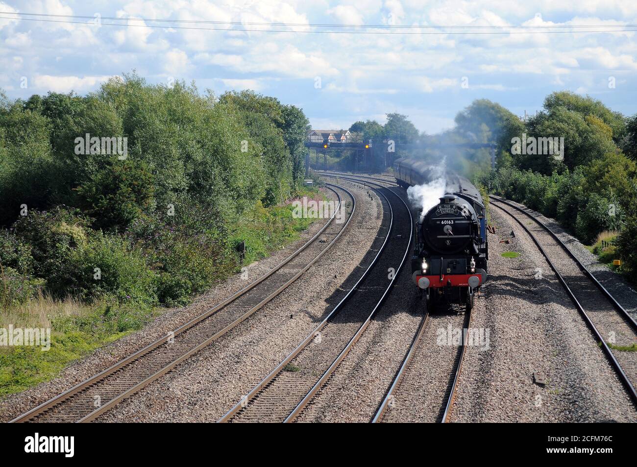 60163 'Tornado' westbound at Magor with a 'Cathedrals Express' for Cardiff Central. Stock Photo