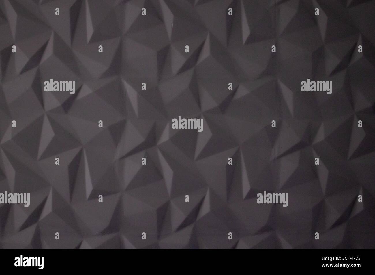 Abstract background of polygons on grey background Stock Photo - Alamy