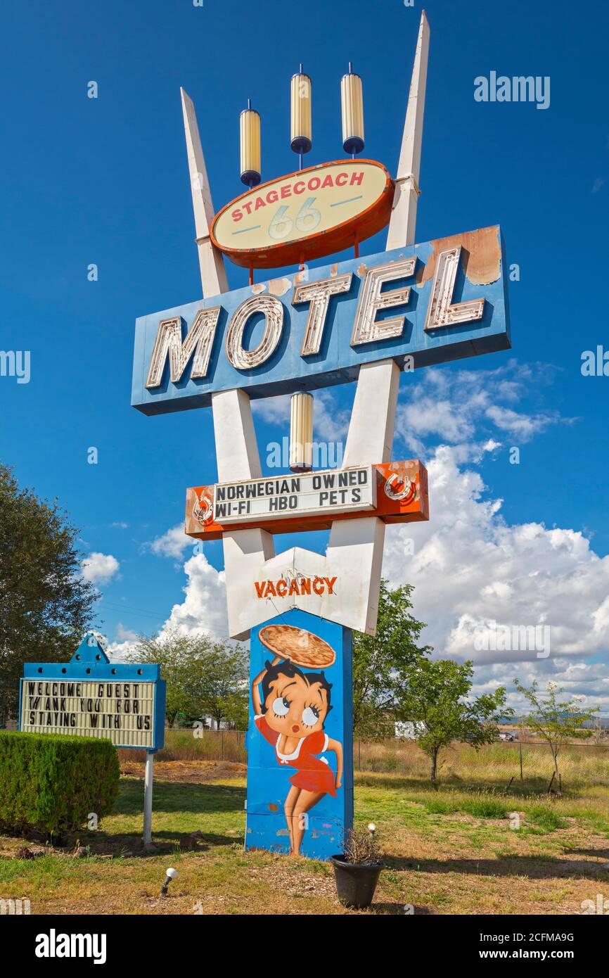 Arizona, Historic Route 66, Seligman, Stagecoach Motel, sign, 1930s cartoon character Betty Boop holding pizza Stock Photo