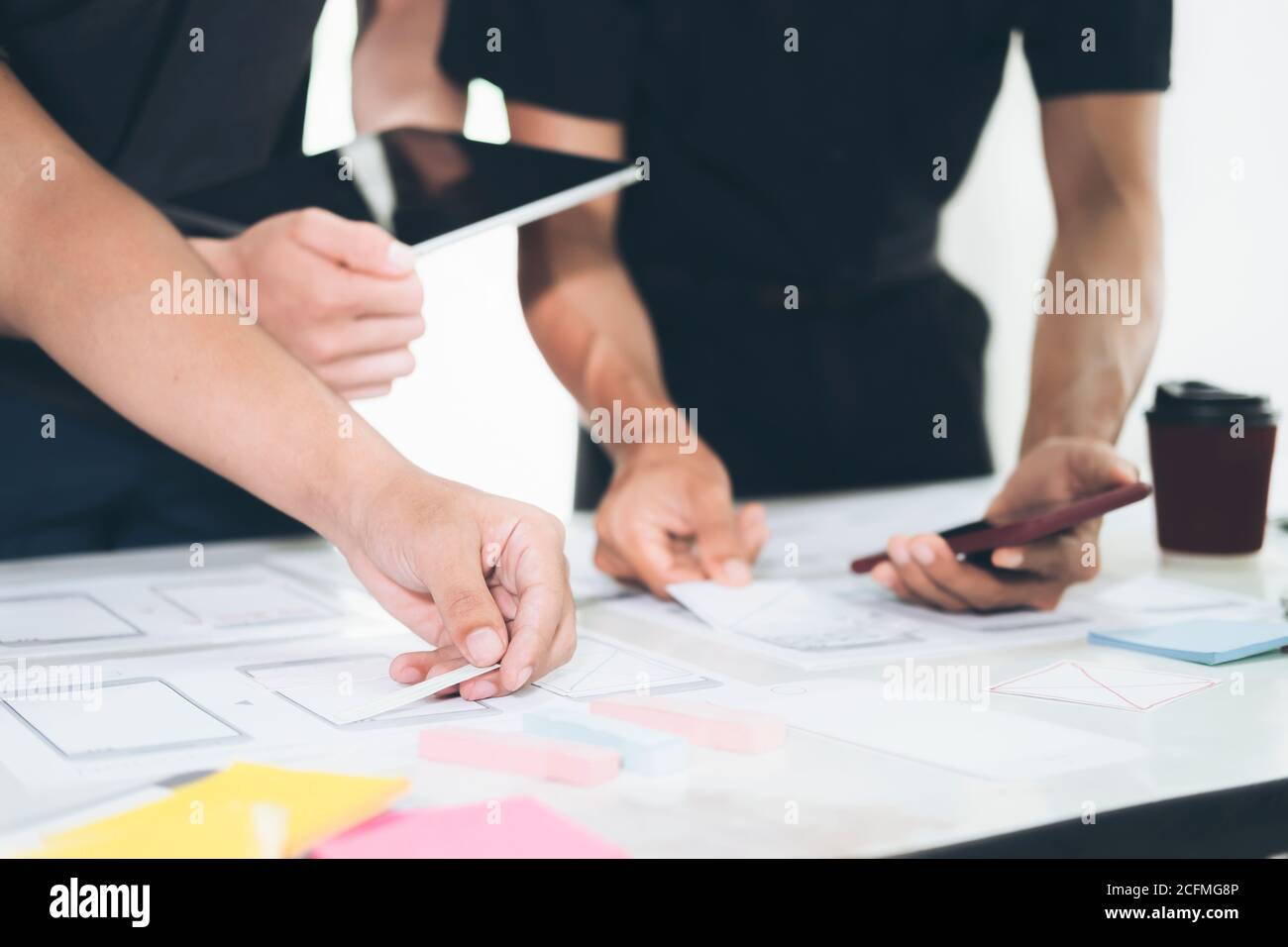 Programmer and UX UI designer working in a software development and co Stock Photo