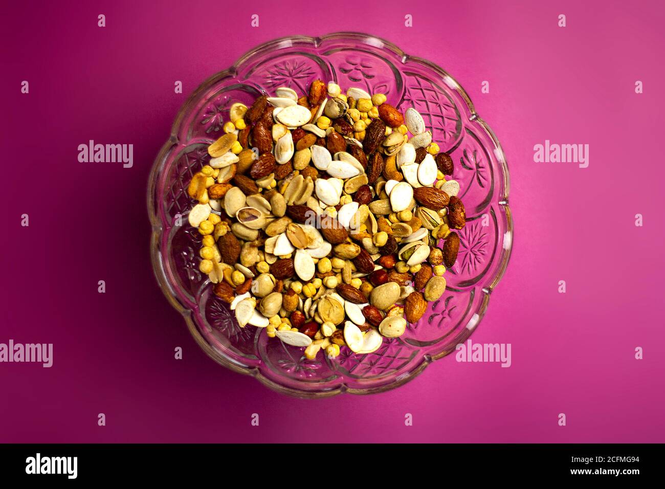 A cut shot of a dry fruits in a colorful table Stock Photo