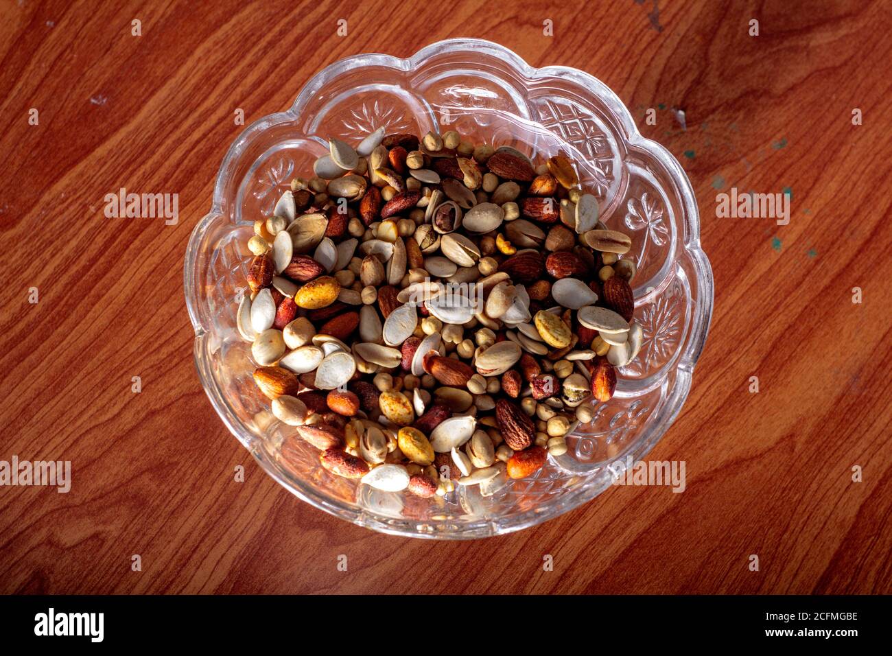 Top shot of a  dry fruits bowl on a table Stock Photo
