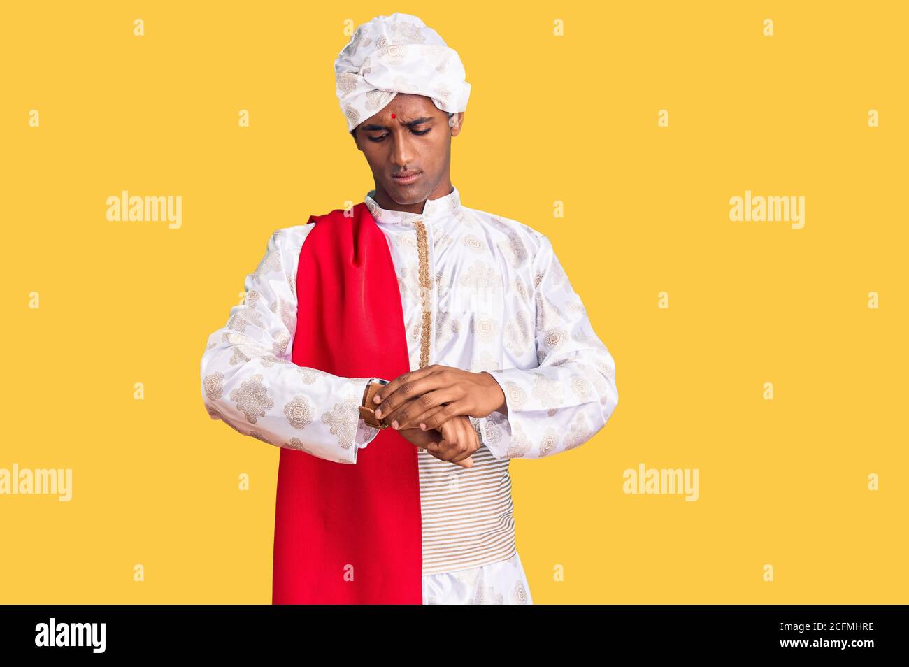 African handsome man wearing tradition sherwani saree clothes