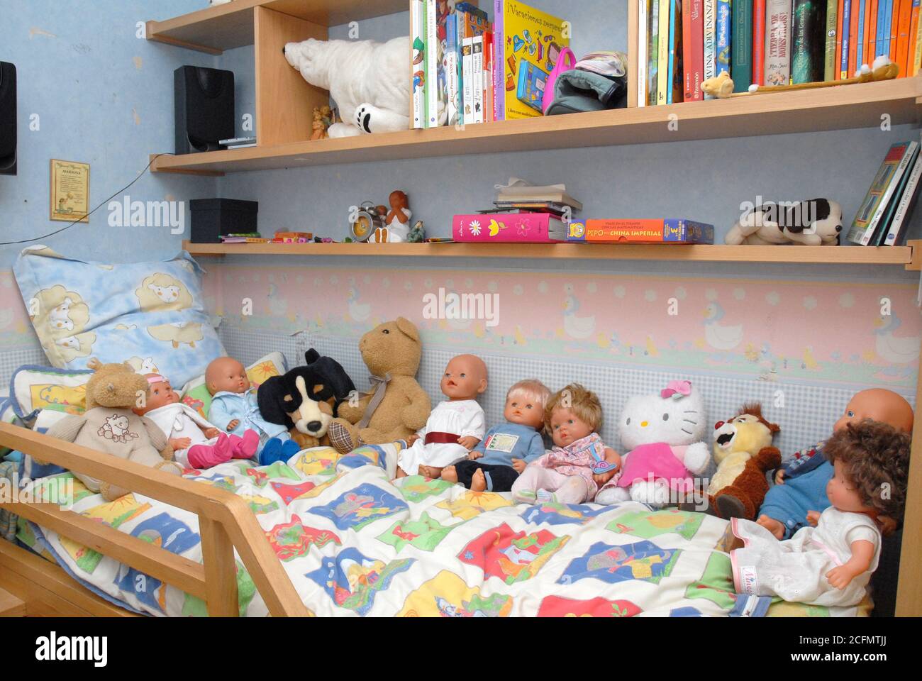 girl's room, dolls, dolls, toys, books, bed, loft bed, stuffed animals, children's room Stock Photo