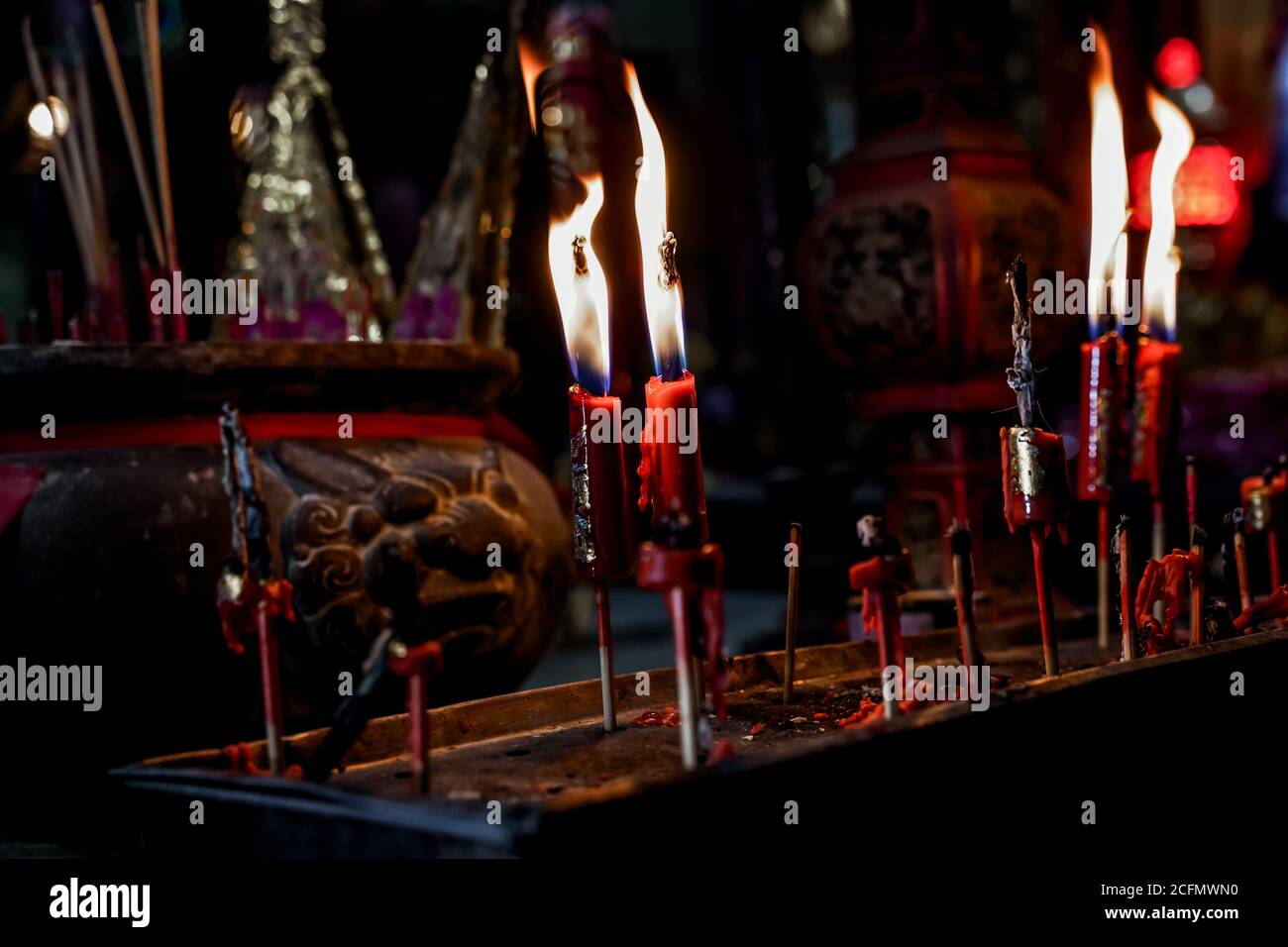 Incense sticks in old chinese temple. Asian traditional culture in