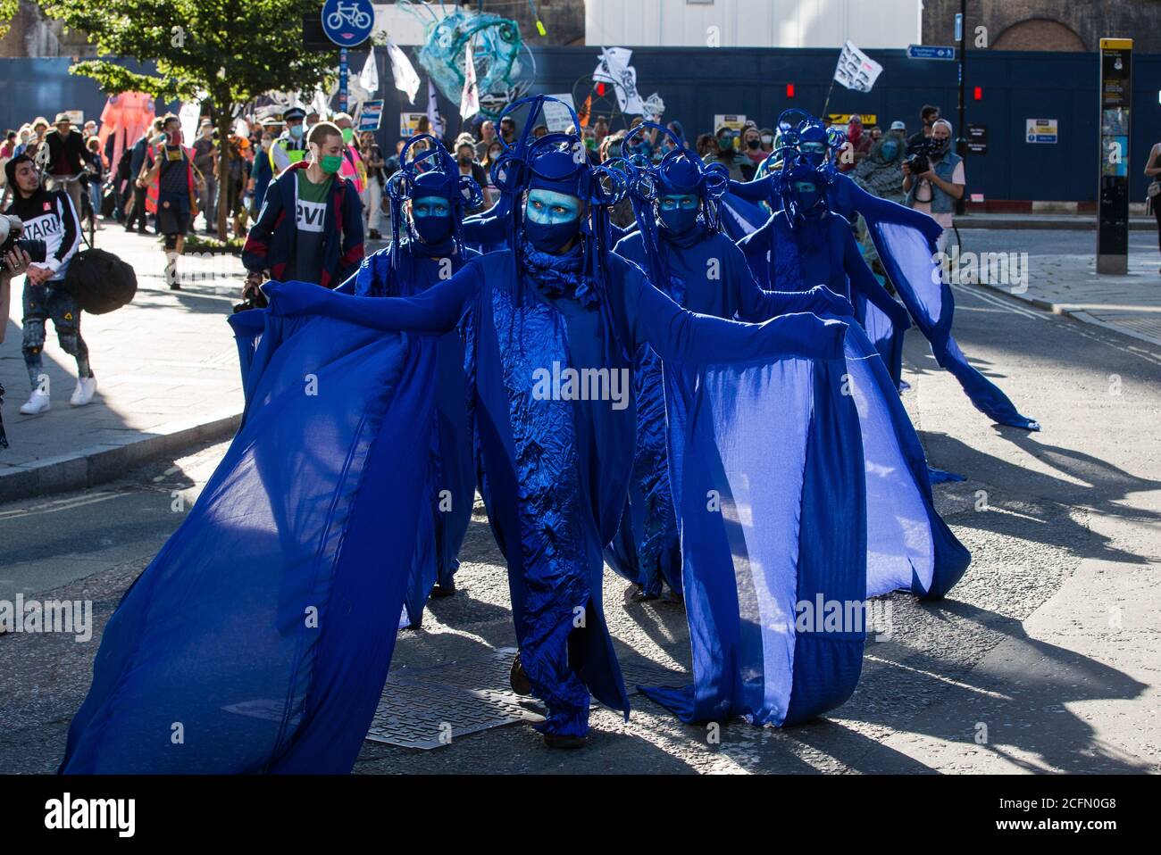 London, UK. 6th September, 2020. The blue rebels join fellow climate activists from the Ocean Rebellion and Extinction Rebellion at a colourful Marine Extinction March. The activists, who are attending a series of September Rebellion protests around the UK, are demanding environmental protections for the oceans and calling for an end to global governmental inaction to save the seas. Credit: Mark Kerrison/Alamy Live News Stock Photo