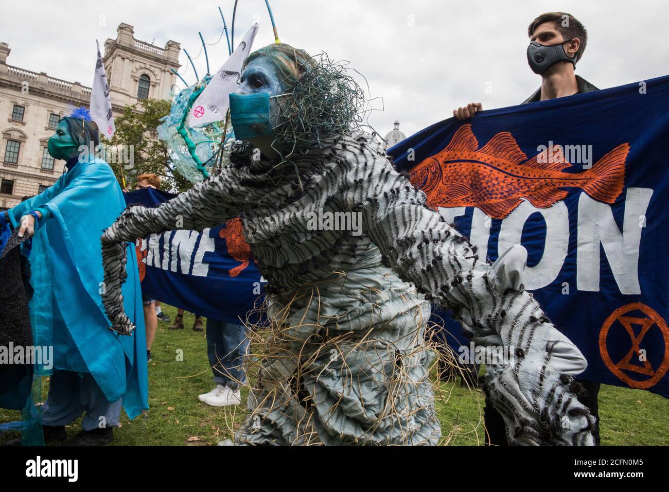 London, UK. 6th September, 2020. Climate activists from the Ocean Rebellion and Extinction Rebellion prepare to take part in a colourful Marine Extinction March. The activists, who are attending a series of September Rebellion protests around the UK, are demanding environmental protections for the oceans and calling for an end to global governmental inaction to save the seas. Credit: Mark Kerrison/Alamy Live News Stock Photo