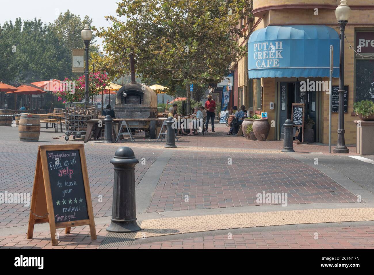 Winters, California, USA, 6 September 2020. The main street of this town was transformed into an open restaurant, yet at 1 pm on Labor Day sunday there are very few custommers. The heat, the smoke from wildfires and the pandemics have chasent custommers away. Stock Photo