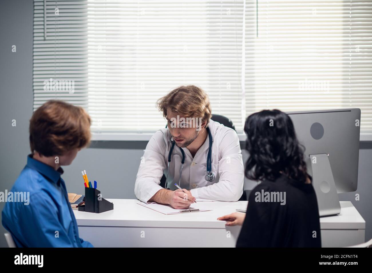 Mature Mother And Son Doctor High Resolution Stock Photography and ...